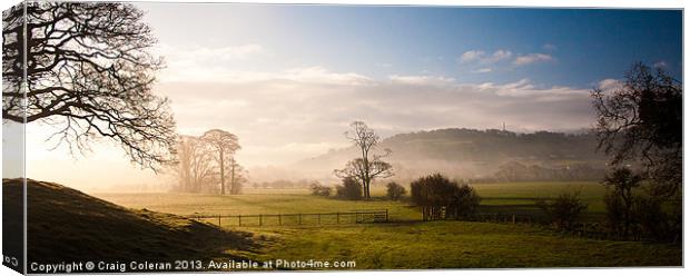 Across the valley in the mist Canvas Print by Craig Coleran