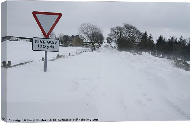 Snowdrift blocking road. Canvas Print by David Birchall