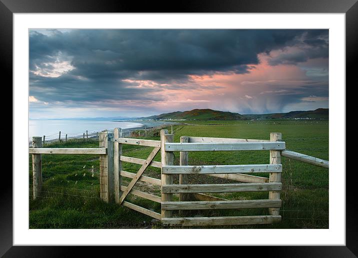Kissing gate with evening sky Framed Mounted Print by Izzy Standbridge