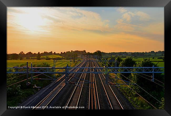 TRACK TO THE SUNSET Framed Print by David Atkinson