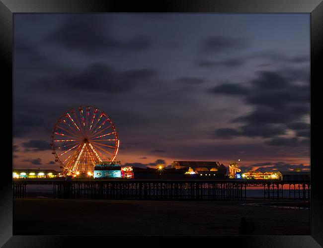 Blackpool South Pier at sunset Framed Print by Paul Watson