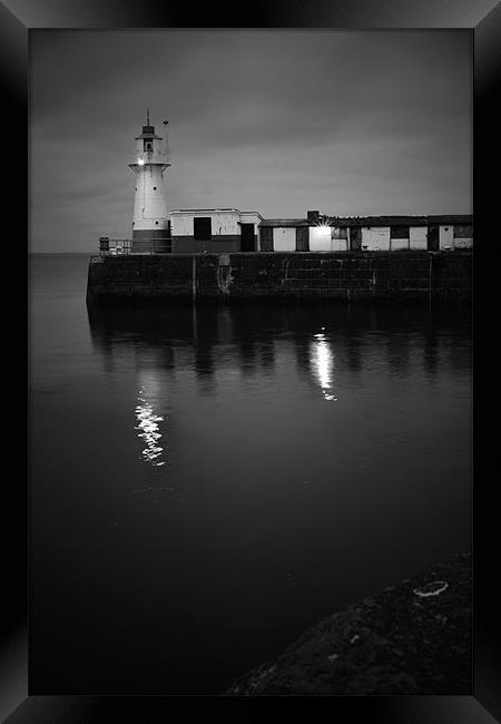 newlyn harbour lighthouse Framed Print by jon betts