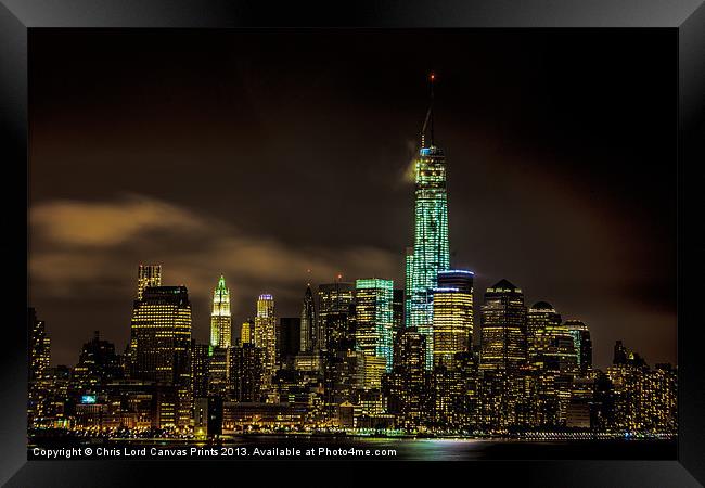 Downtown Manhattan At Night Framed Print by Chris Lord