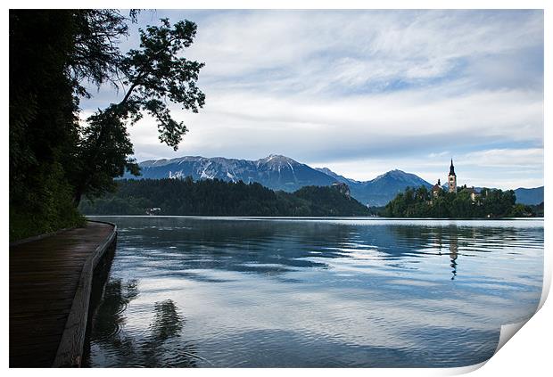 After storm light over Lake Bled Print by Ian Middleton