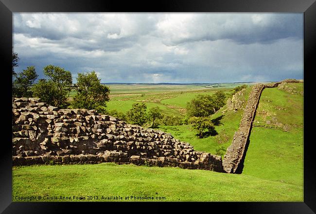 Hadrians Wall Marching Across The Landscape Framed Print by Carole-Anne Fooks