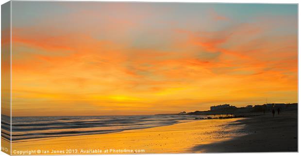 Seascape all oranges and yellows Canvas Print by Ian Jones