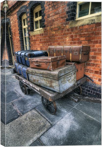 Luggage at the Station Canvas Print by Ian Mitchell