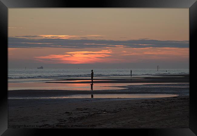 Sun set on Crosby beach Framed Print by simon sugden