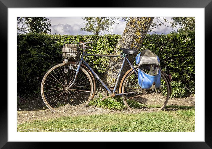 Tired old Bicycle Framed Mounted Print by Ian Jones