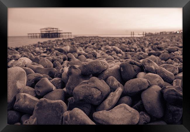 Brighton Pebbles and Pier Framed Print by Adam Moseley