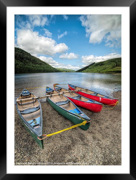 Canoes at Geirionydd Lake Framed Mounted Print by Adrian Evans