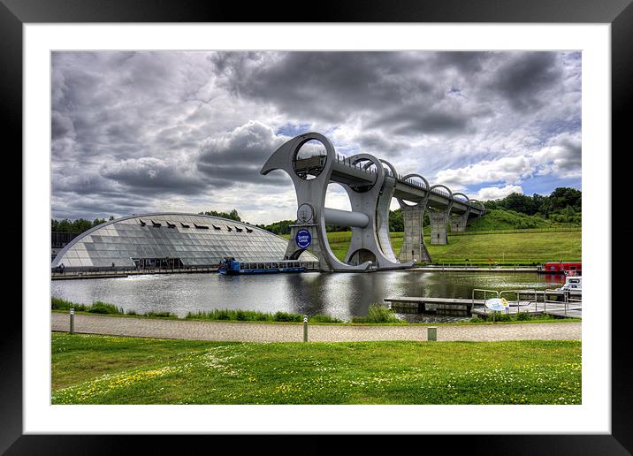 Rotating Boat Lift Framed Mounted Print by Tom Gomez