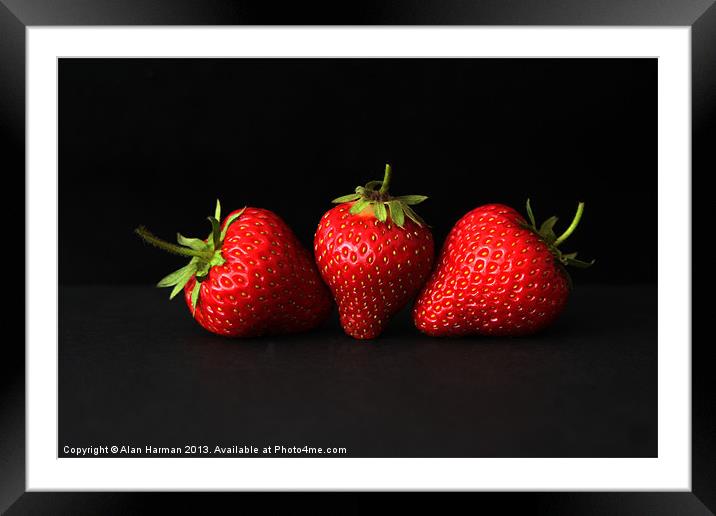 Three Strawberries On Black Framed Mounted Print by Alan Harman
