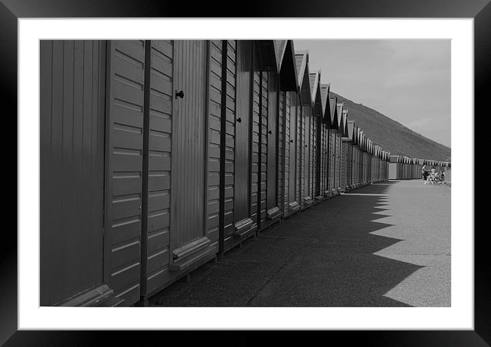 Beach huts in Whitby Framed Mounted Print by James Marsden