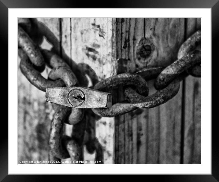 Chained shut Framed Mounted Print by Ian Jones