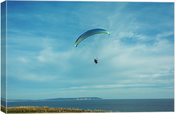 Paragliding in the Solent Canvas Print by Ian Jones