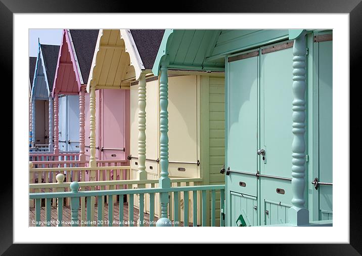 Mersea beach huts Framed Mounted Print by Howard Corlett