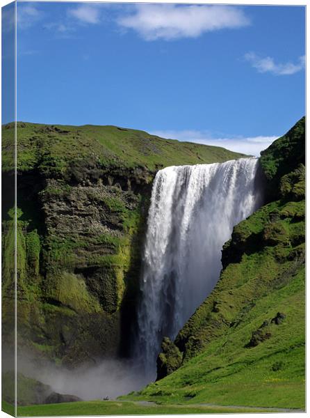 Skógafoss waterfall Iceland Canvas Print by Kay Gorzko