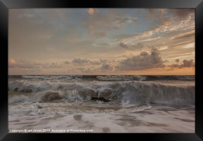 Sunset and waves Framed Print by Ian Jones