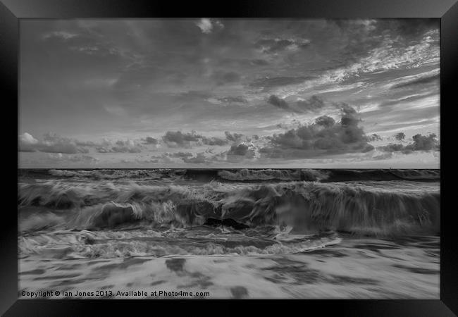 Waves breaking on the beach Framed Print by Ian Jones