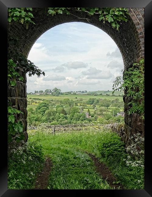 Winkhill village through an arch Framed Print by Rob Howell