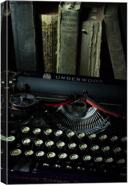 Vintage Typewriter and Old Books Canvas Print by Ann Garrett