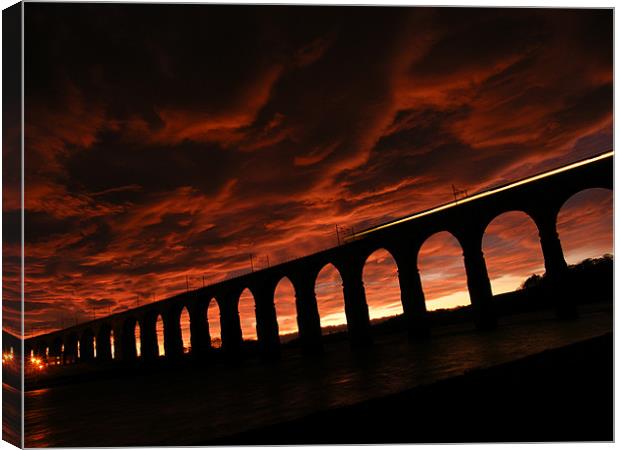 sunset bridge Canvas Print by david reece
