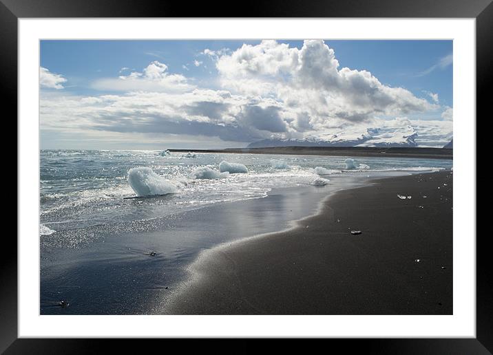 Ice on the beach Framed Mounted Print by Louise McKenzie