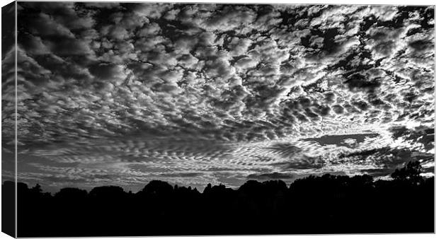sunset and clouds black and white Canvas Print by Dean Messenger