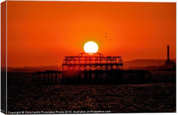 Sunset Over The West Pier Canvas Print by Chris Lord
