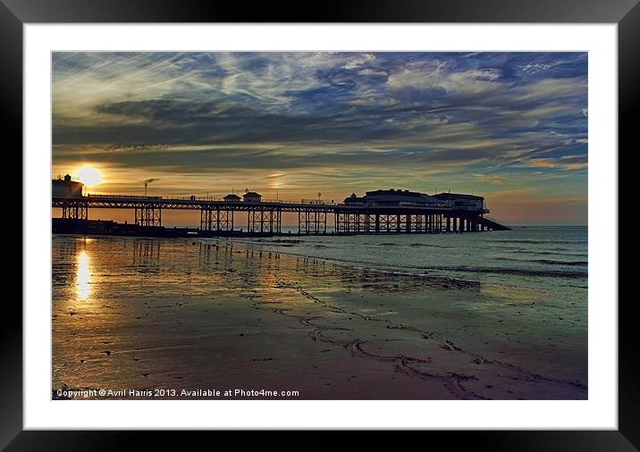 Cromer Pier at sunset Framed Mounted Print by Avril Harris
