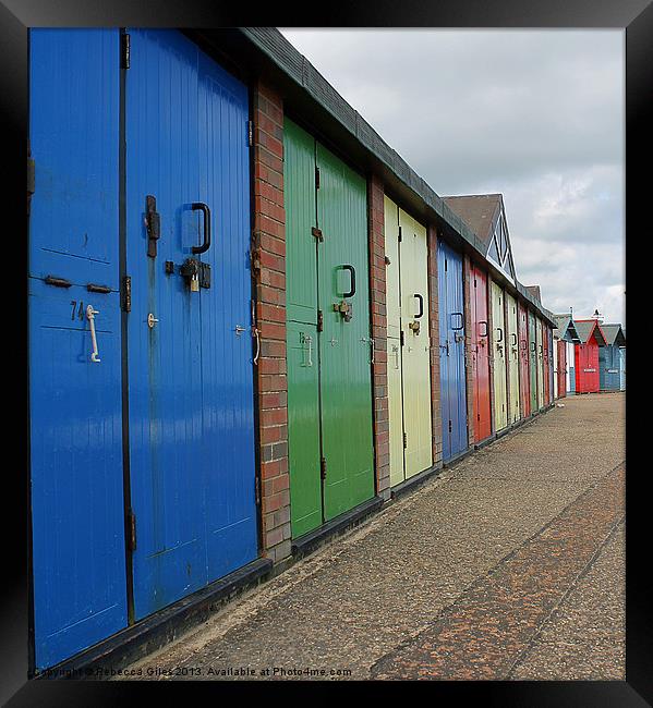 Beach Huts Framed Print by Rebecca Giles