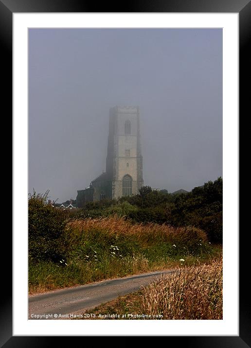 Ghostly Happisburgh church in a sea fret Framed Mounted Print by Avril Harris