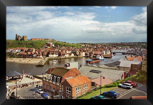 Whitby Holiday Town Framed Print by Carole-Anne Fooks