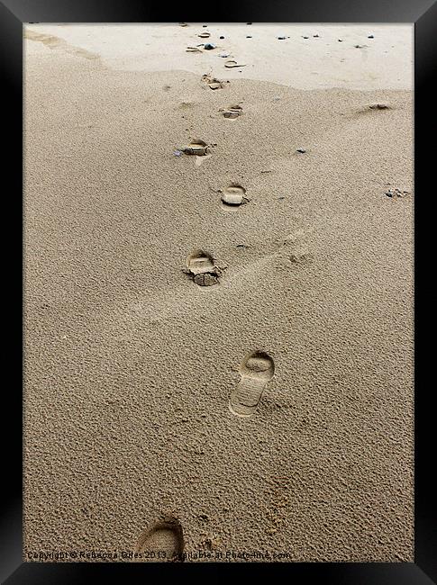 Footprint in the sand Framed Print by Rebecca Giles