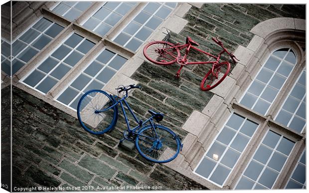 Bikes on the Wall Canvas Print by Helen Northcott