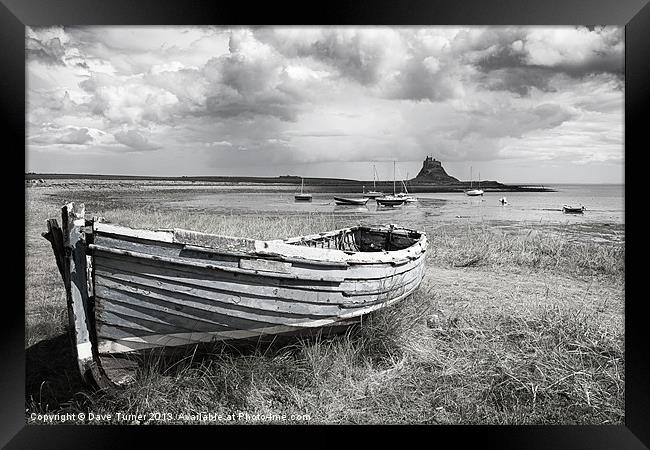 Lindisfarne Castle and Boat Framed Print by Dave Turner