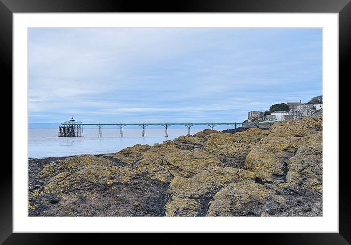 Clevedon Pier behind the rocks Framed Mounted Print by Levente Baroczi