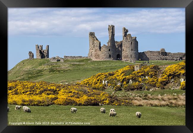 Dunstanburgh castle Framed Print by Kevin Tate