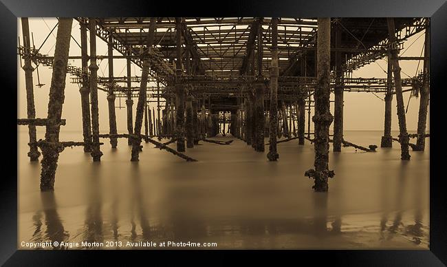 Derelict Hastings Pier Framed Print by Angie Morton