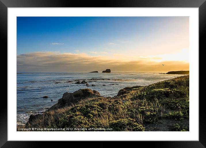 Sunset on coastline Framed Mounted Print by Panas Wiwatpanachat