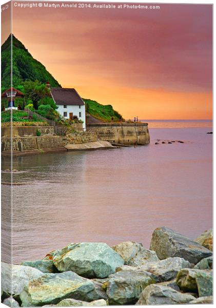 Evening over Runswick Bay Cottage North Yorkshire Canvas Print by Martyn Arnold