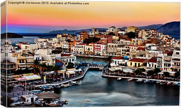 Agios Nikolaos At Sunset Canvas Print by Jim kernan