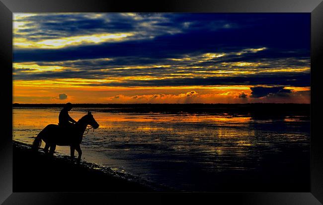 The Sunset Rider Framed Print by Jon Clifton