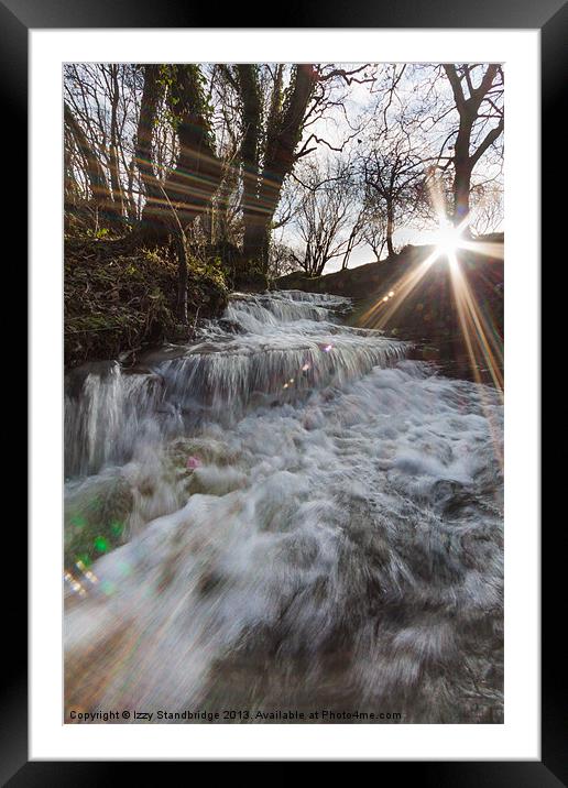 LENS FLARE with gushing stream, winter Framed Mounted Print by Izzy Standbridge
