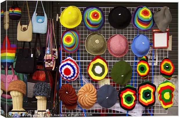 The hats have it. Canvas Print by Perry Johnson