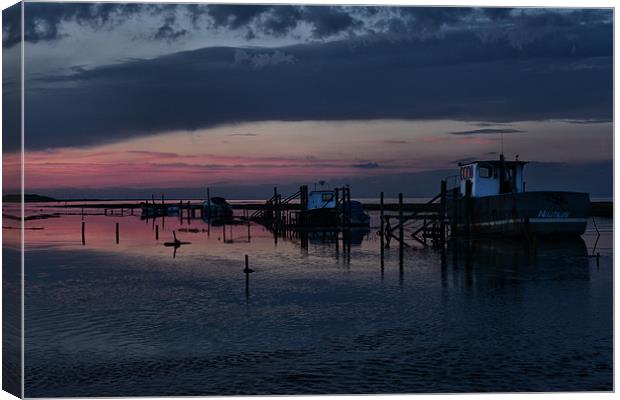 Sunset over Thornham harbour Canvas Print by Gary Pearson