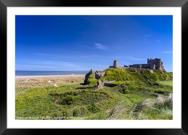 Bamburgh castle and beach Framed Mounted Print by Kevin Tate