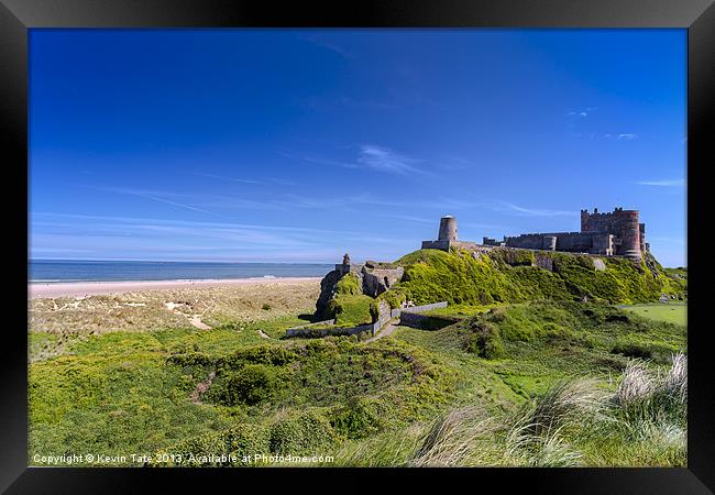 Bamburgh castle and beach Framed Print by Kevin Tate