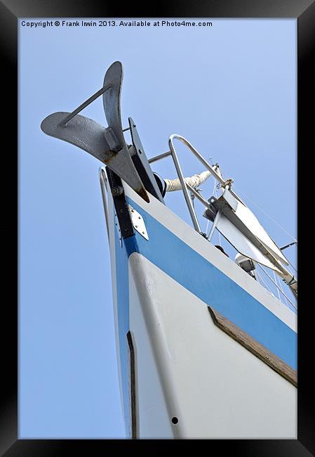 The bow of a yacht set against a blue sky. Framed Print by Frank Irwin